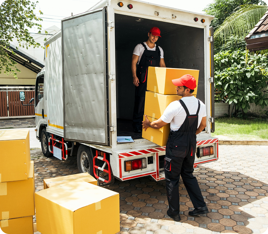 Movers loading boxes into a truck