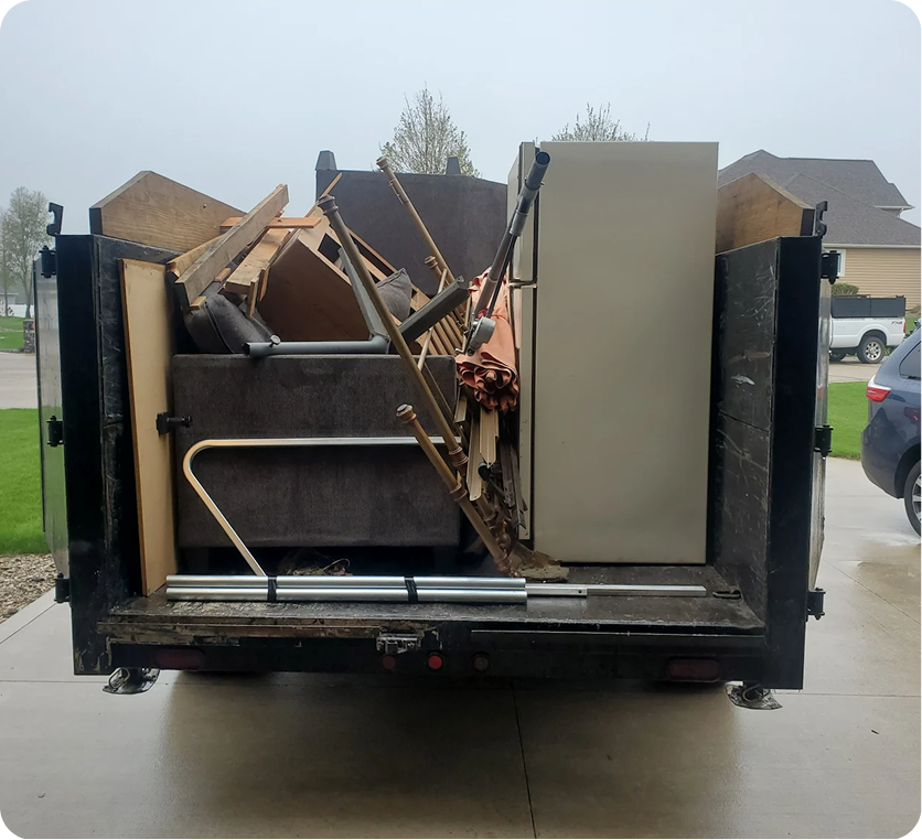 Hauling away old furniture pieces